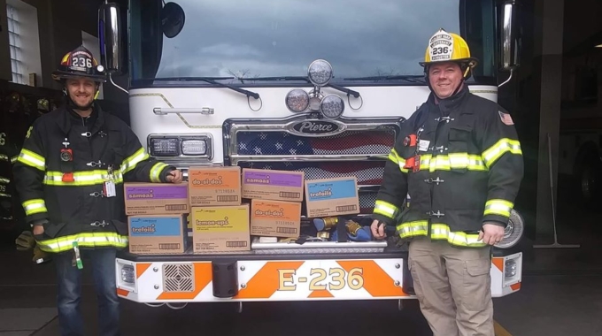 Girl Scouts Donate Cookies to Firefighters